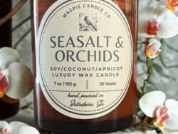 Candle with sea salt and orchids label.