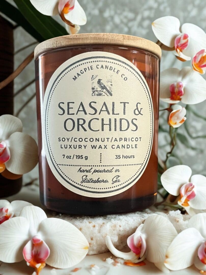 Candle with sea salt and orchids label.
