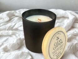 Black candle with "Clean Cotton" label.